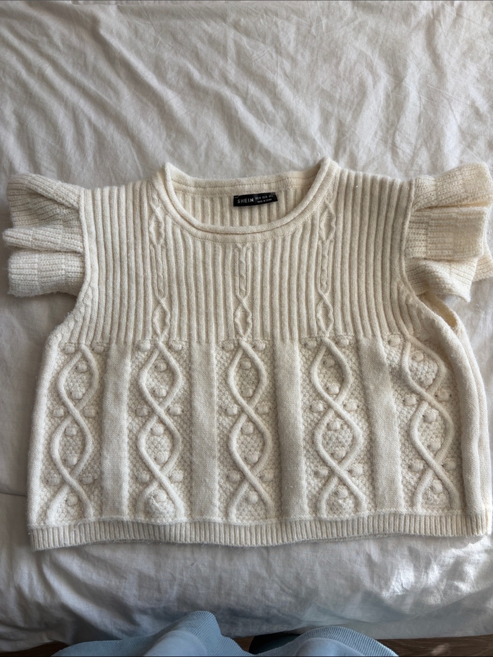 Cropped short sleeve sweater